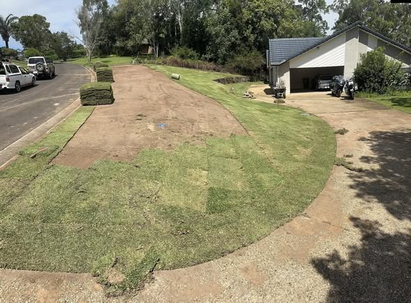 Full re-turf — rolls laid out and bedded in